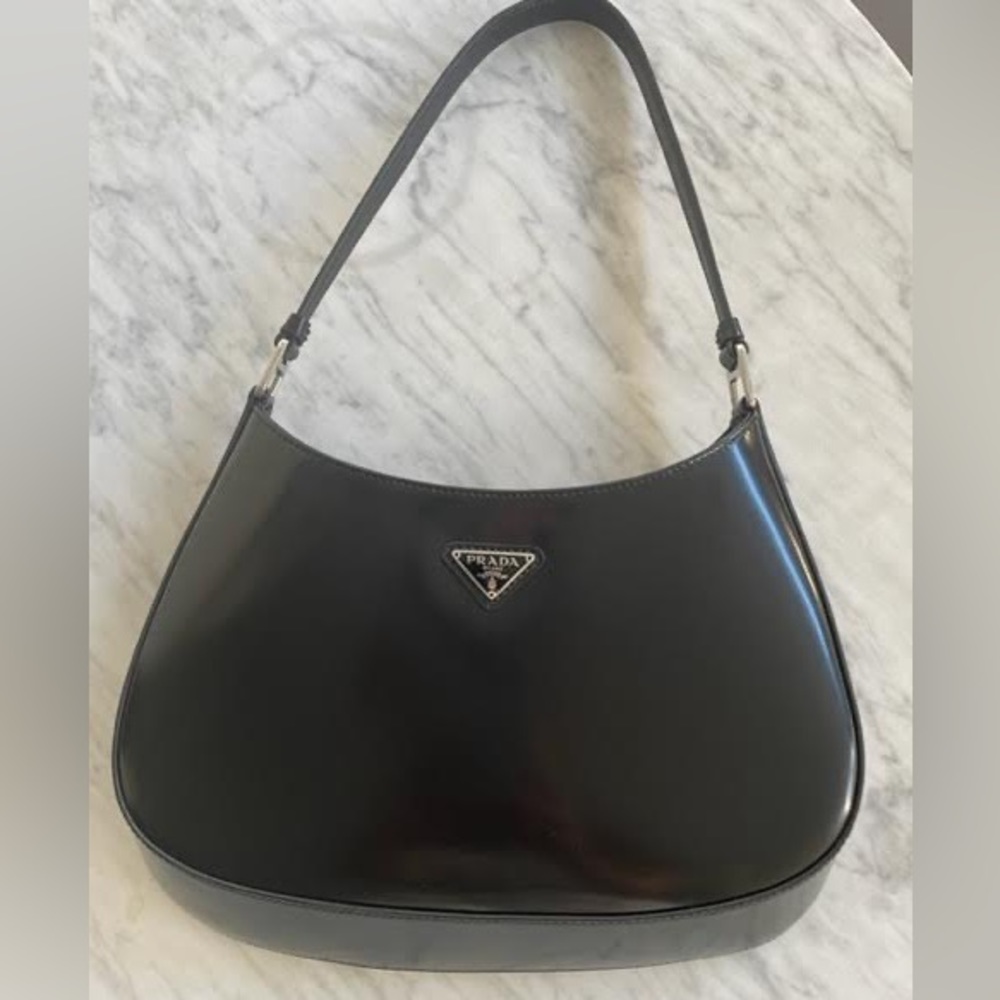 Brand new Prada bag, never been work and in perfect condition.
